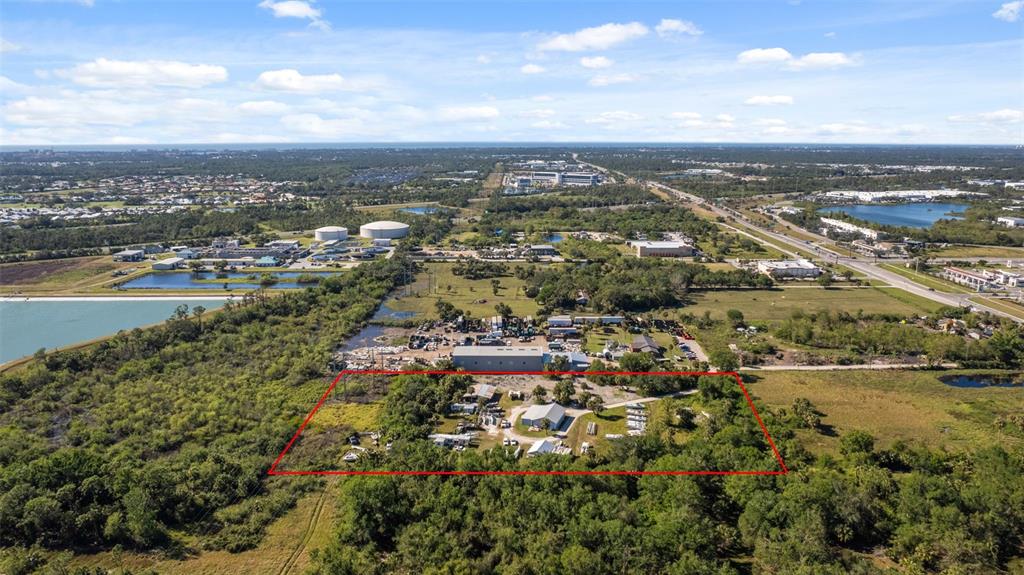 3530 Laurel Road East, Unit A North Venice, FL 34275 - Photo 3 of 17 an aerial view of residential building and ocean