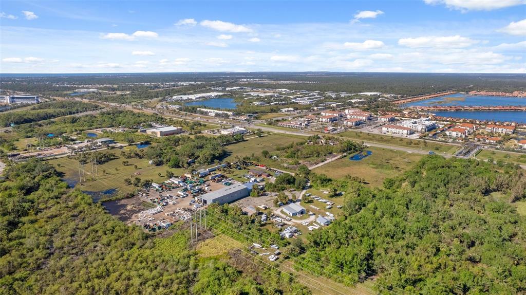 3530 Laurel Road East, Unit A North Venice, FL 34275 - Photo 7 of 17 an aerial view of residential houses with outdoor space