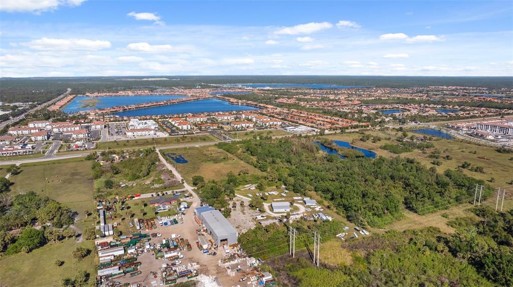 3530 Laurel Road East, Unit A North Venice, FL 34275 - Photo 10 of 17 an aerial view of residential houses with outdoor space