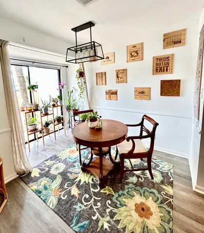a dining room with furniture and a table