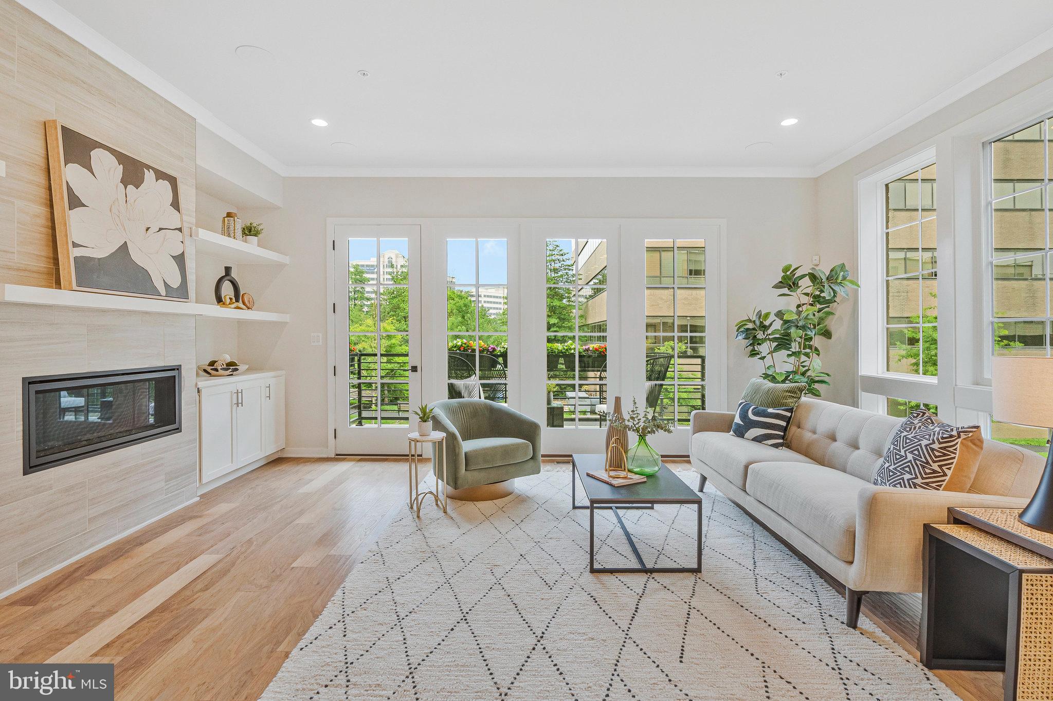 11724 Paysons Way Reston, VA 20191 - Photo 16 of 41 a living room with furniture and a fireplace