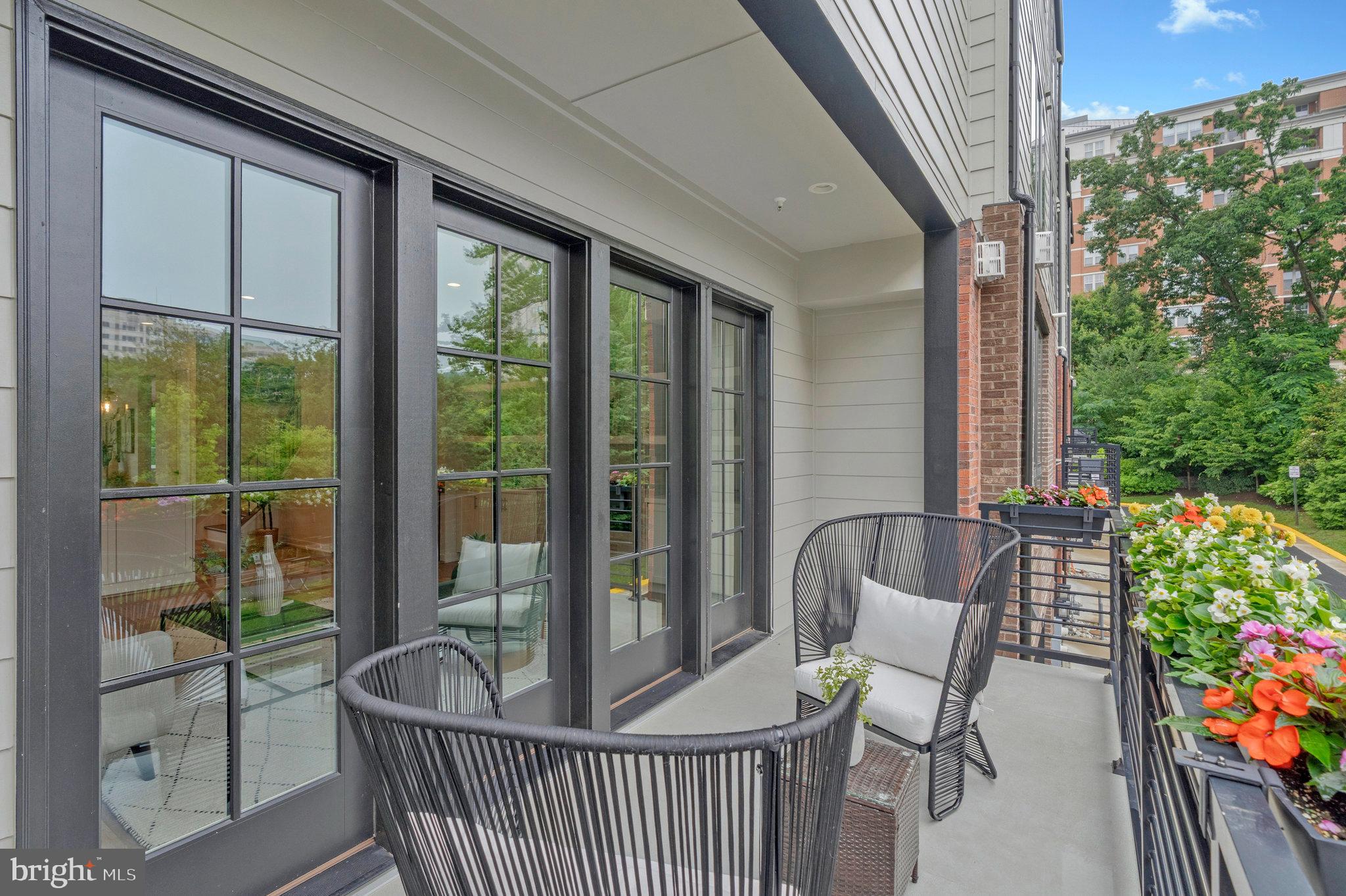 11724 Paysons Way Reston, VA 20191 - Photo 19 of 41 a view of a porch with furniture and garden