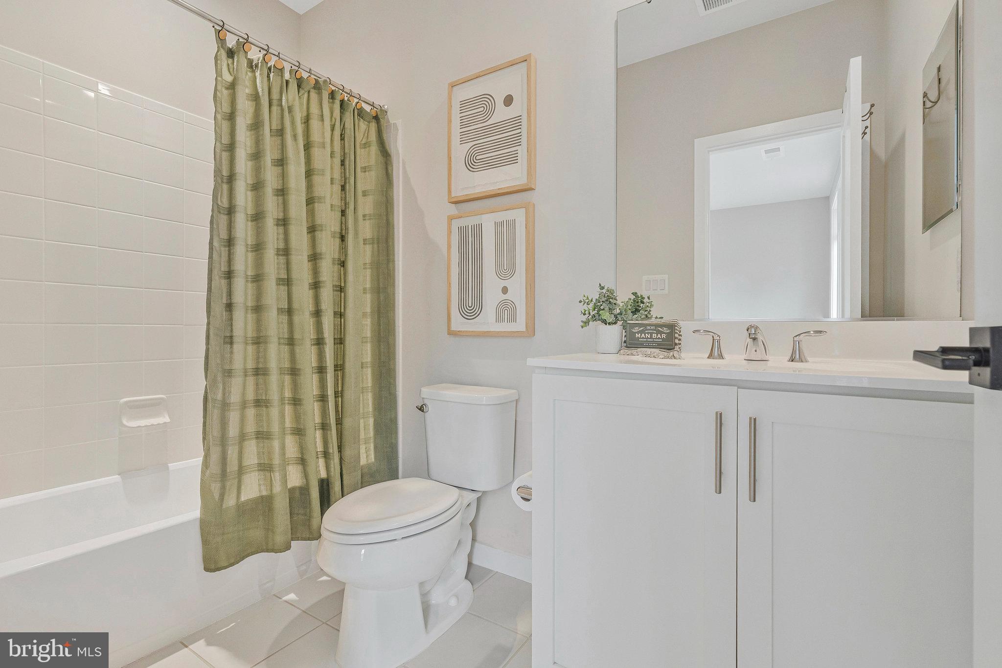 11724 Paysons Way Reston, VA 20191 - Photo 22 of 41 a bathroom with a sink toilet and shower