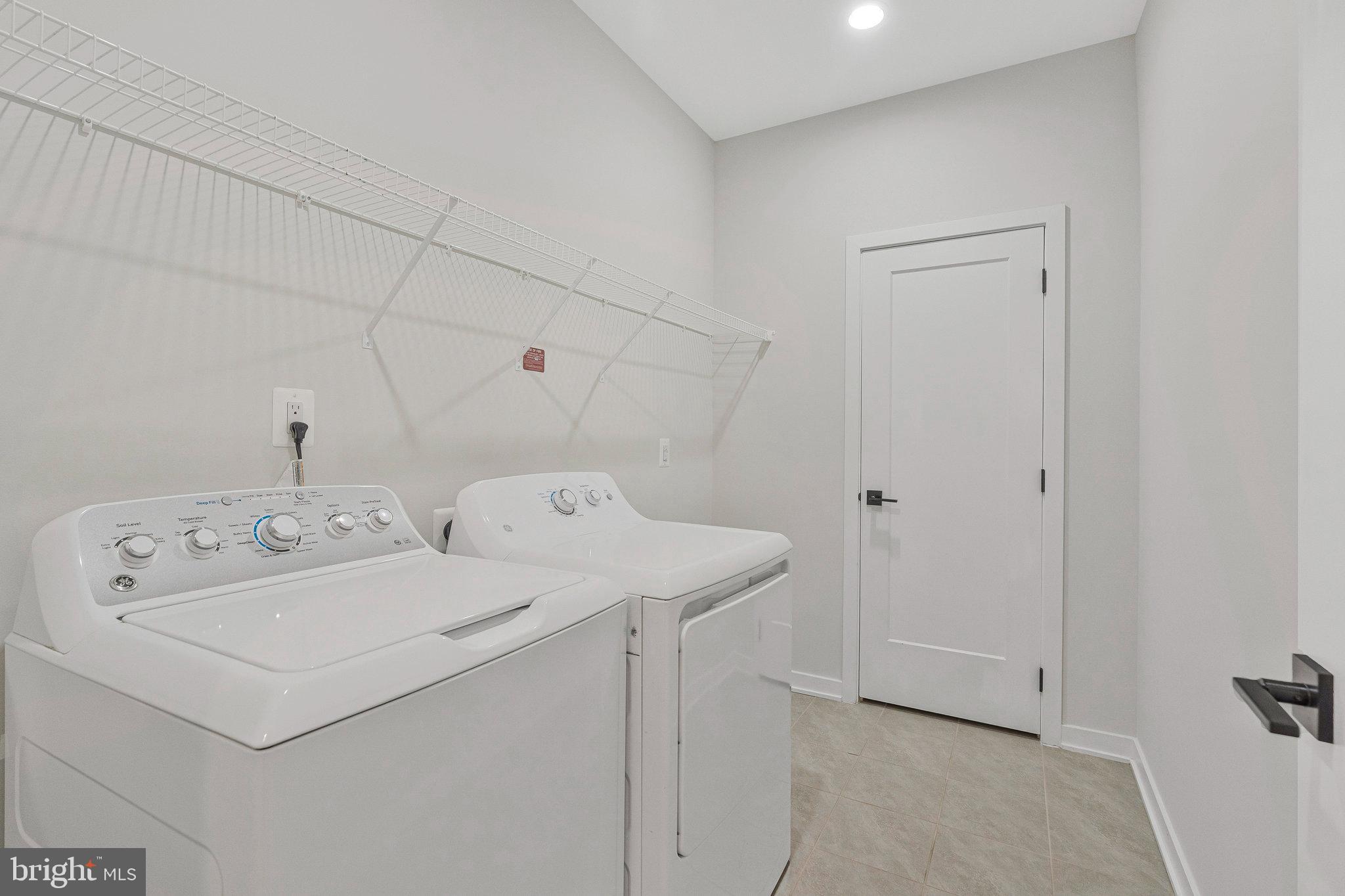 11724 Paysons Way Reston, VA 20191 - Photo 23 of 41 a utility room with dryer and washer