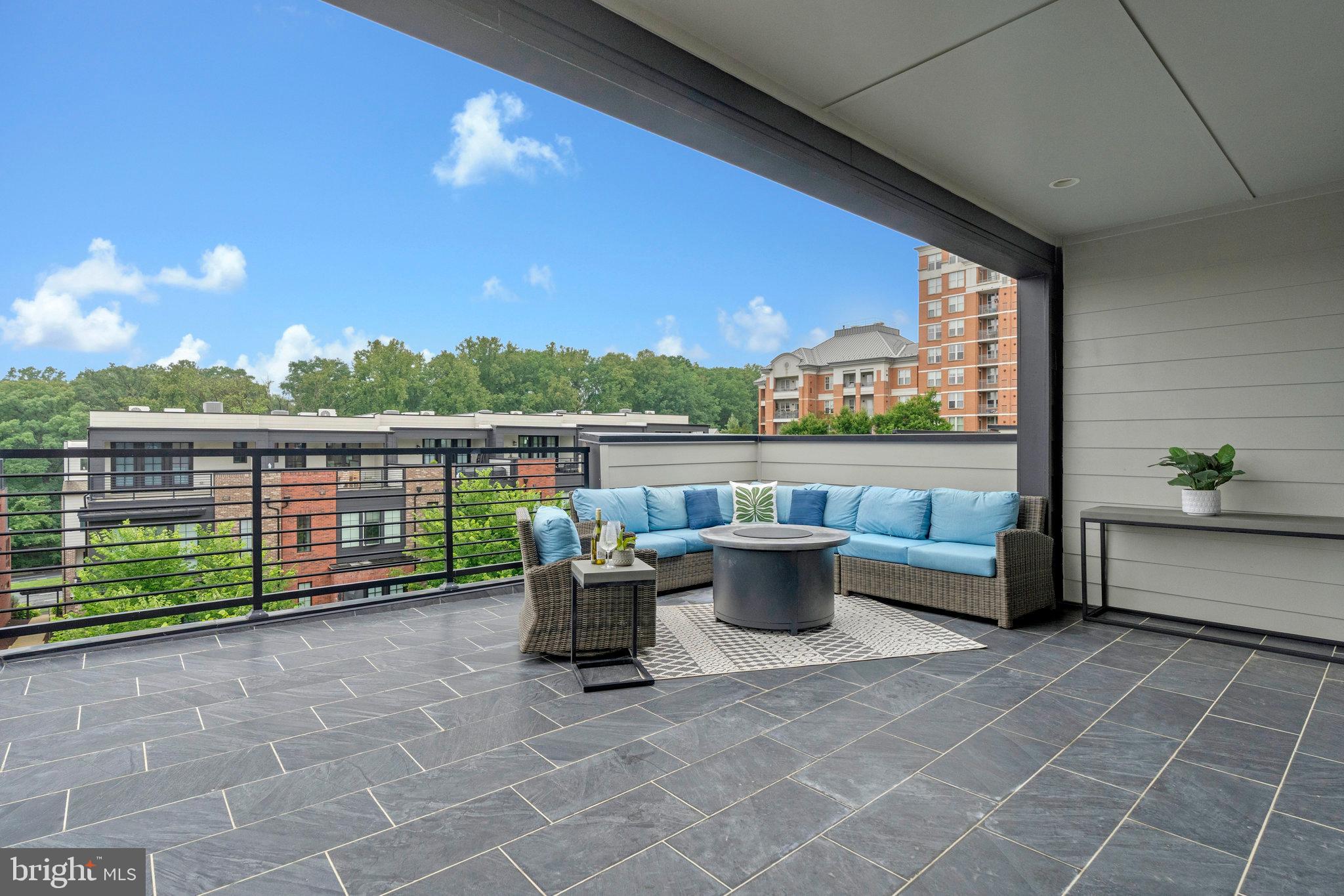 11724 Paysons Way Reston, VA 20191 - Photo 36 of 41 a view of balcony with couch and chairs