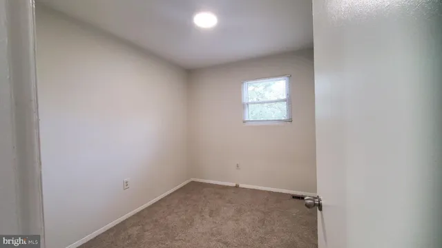 a kitchen with a stove and a refrigerator