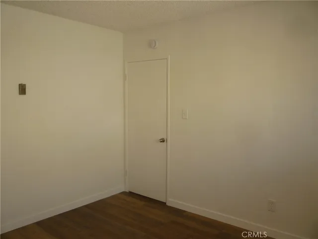 a view of small space with wooden floor