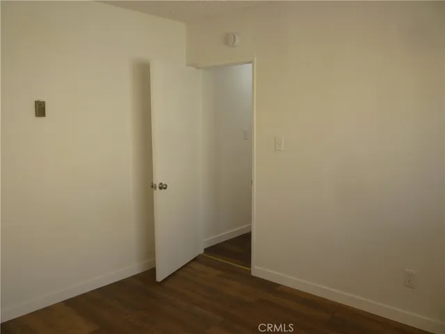 a view of small space with wooden floor