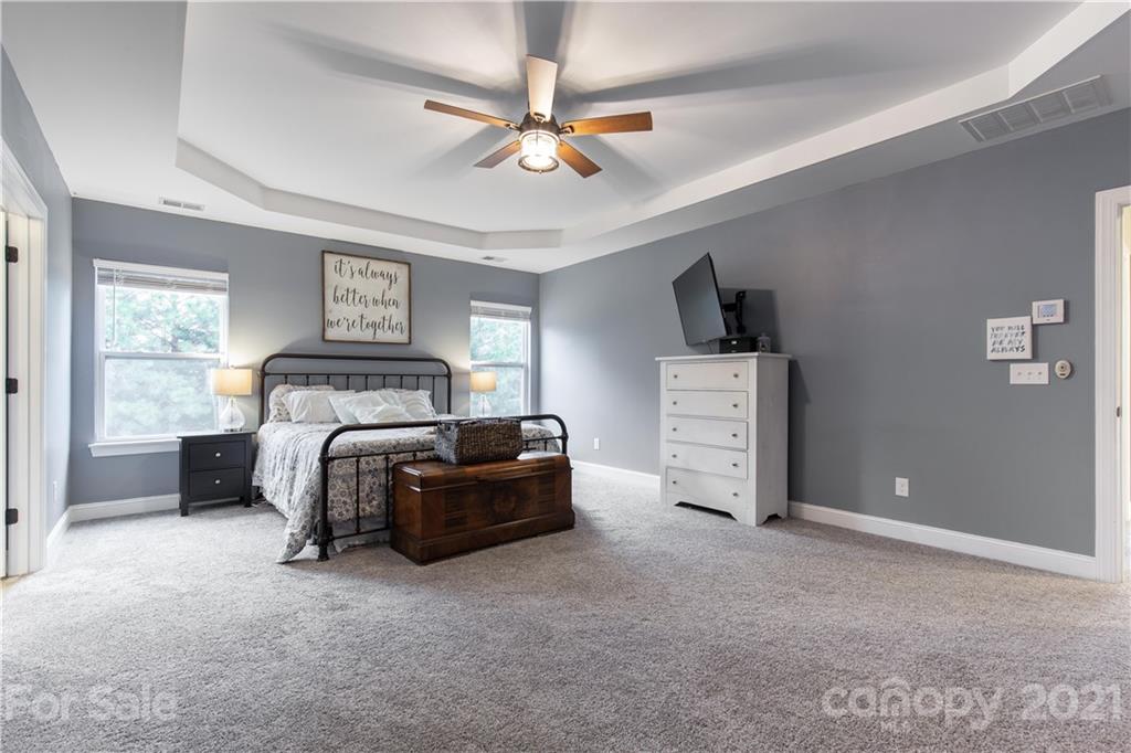 86512 Arrington Road Lancaster, SC 29720 - Photo 25 of 31 a bedroom with a bed and a television