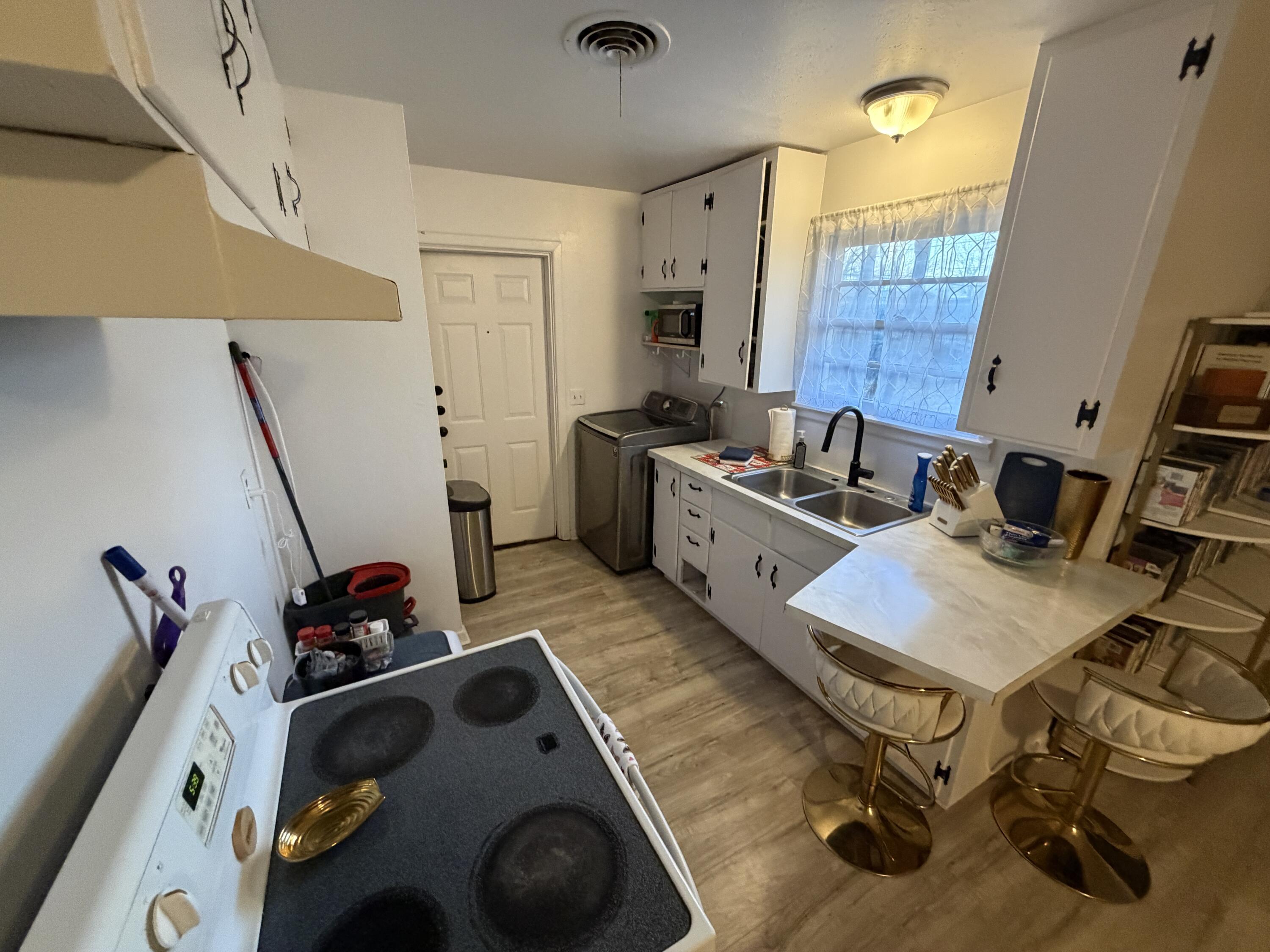 5110 46th Street Lubbock, TX 79414 - Photo 5 of 10 a view of a room with gym equipment