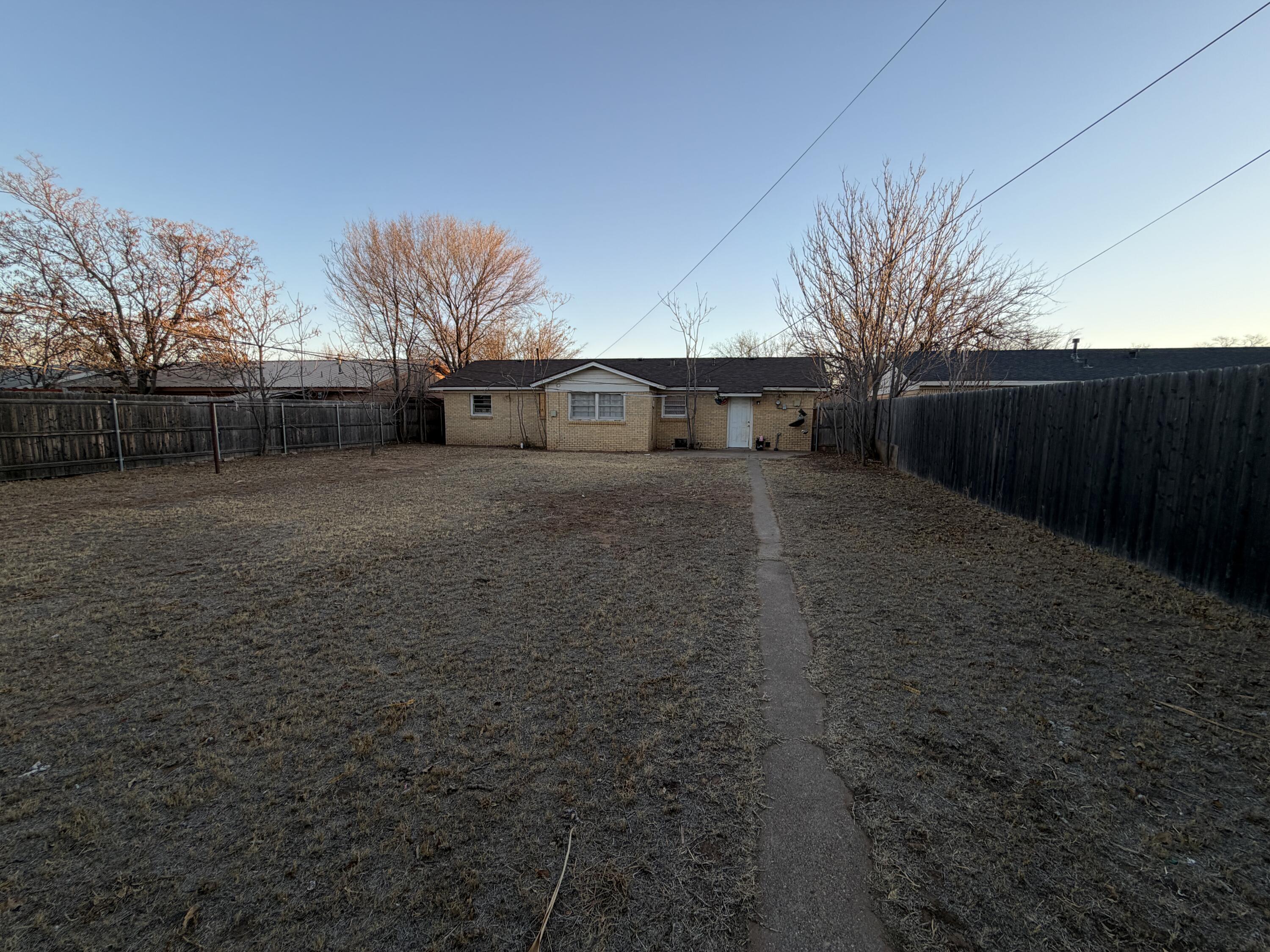 5110 46th Street Lubbock, TX 79414 - Photo 10 of 10 a backyard of a house