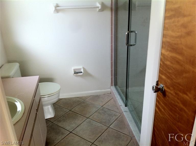 17432 Lebanon Road Fort Myers, FL 33967 - Photo 11 of 20 a bathroom with a toilet and a shower