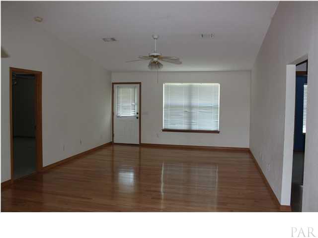 4091 Schifko Road Cantonment, FL 32533 - Photo 11 of 19 Living Room with Hardwood floors.