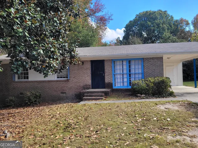 a view of a house with a patio