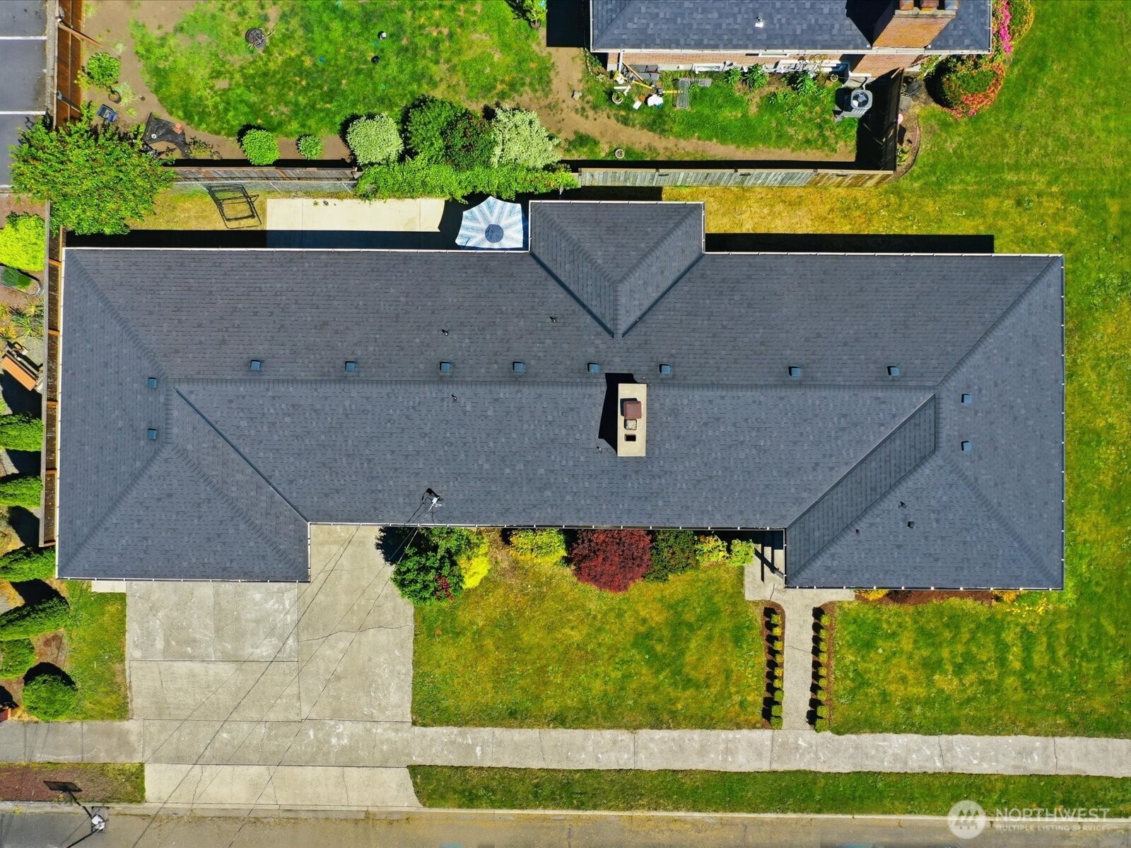 1417 Maple Street Sumner, WA 98390 - Photo 8 of 40 an aerial view of a house with a yard