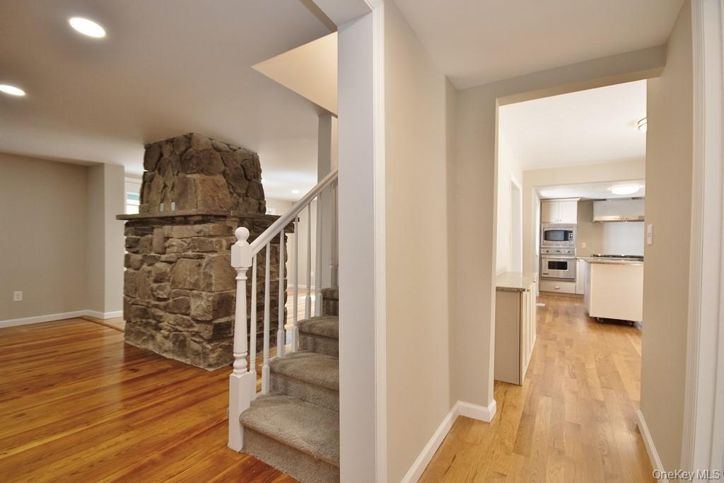 151 Airport Road Bethel, NY 12762 - Photo 12 of 19 a view of entryway and kitchen with wooden floor