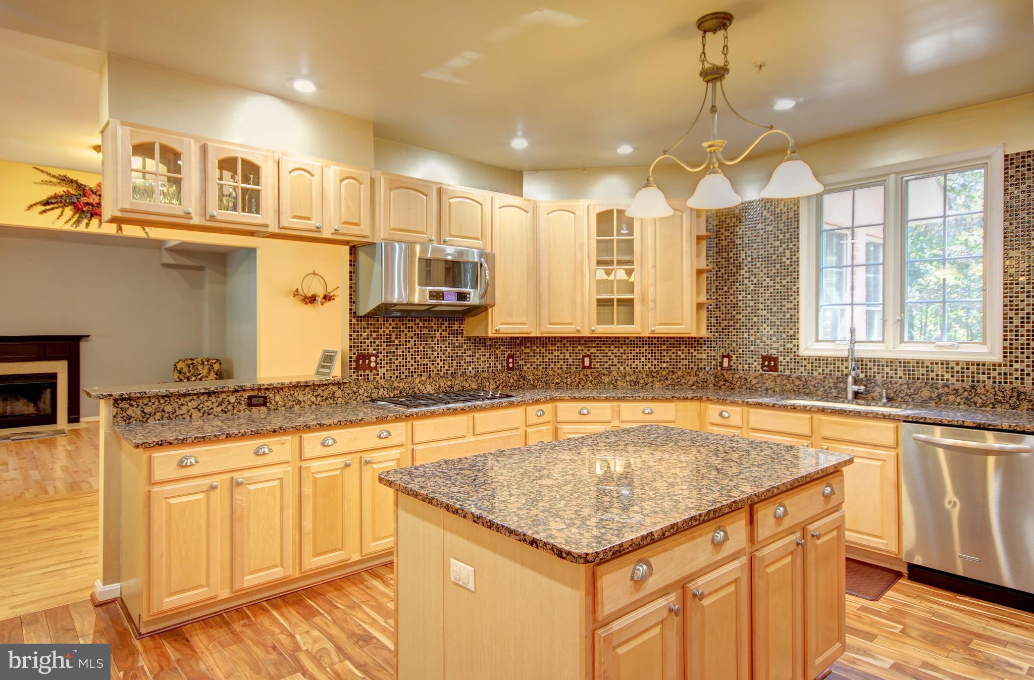 9020 Race Track Road Bowie, MD 20715 - Photo 2 of 52 Gourmet kitchen with custom hardwood & Island
