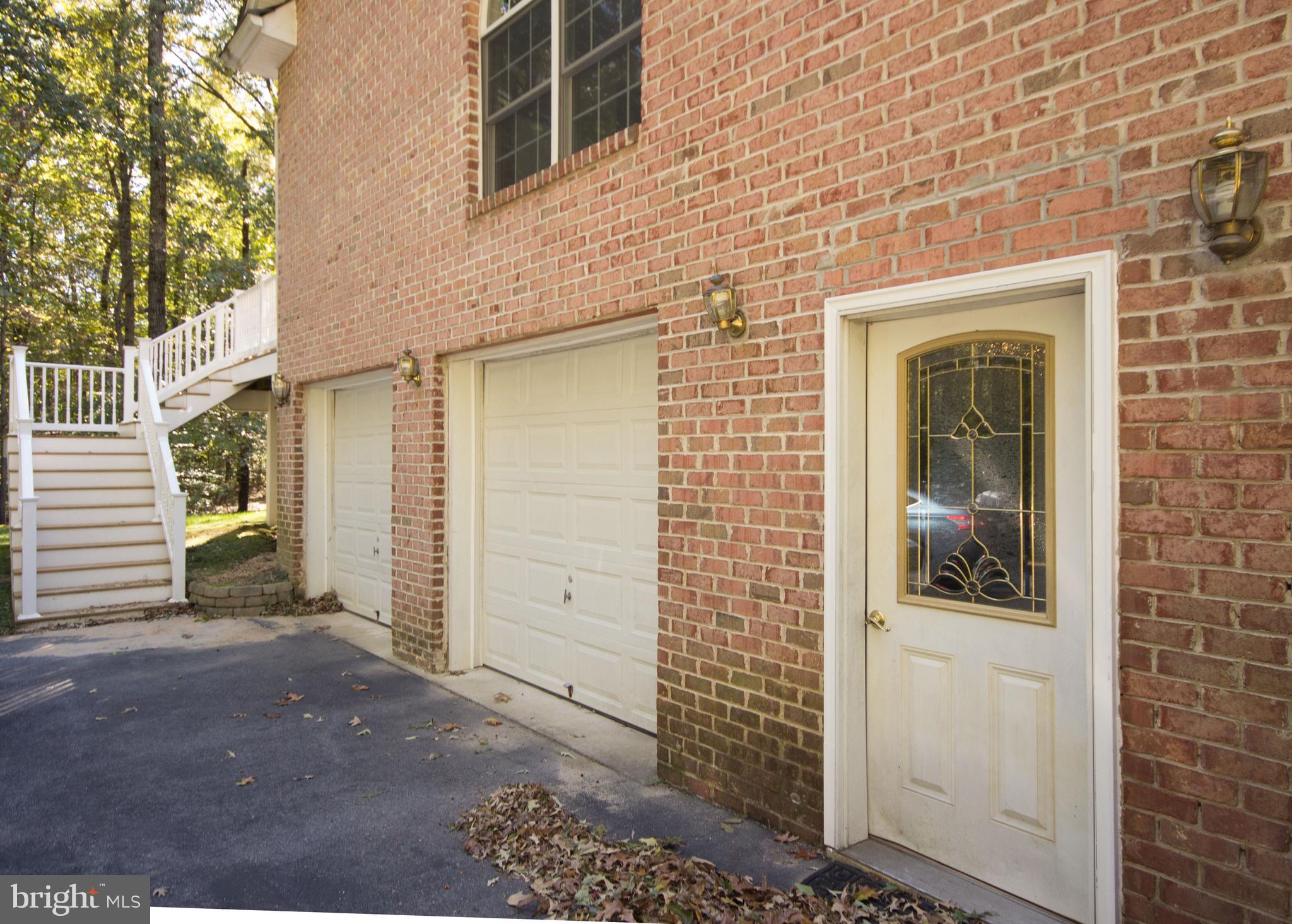 9020 Race Track Road Bowie, MD 20715 - Photo 41 of 52 Oversized 2 car garage w/entrance