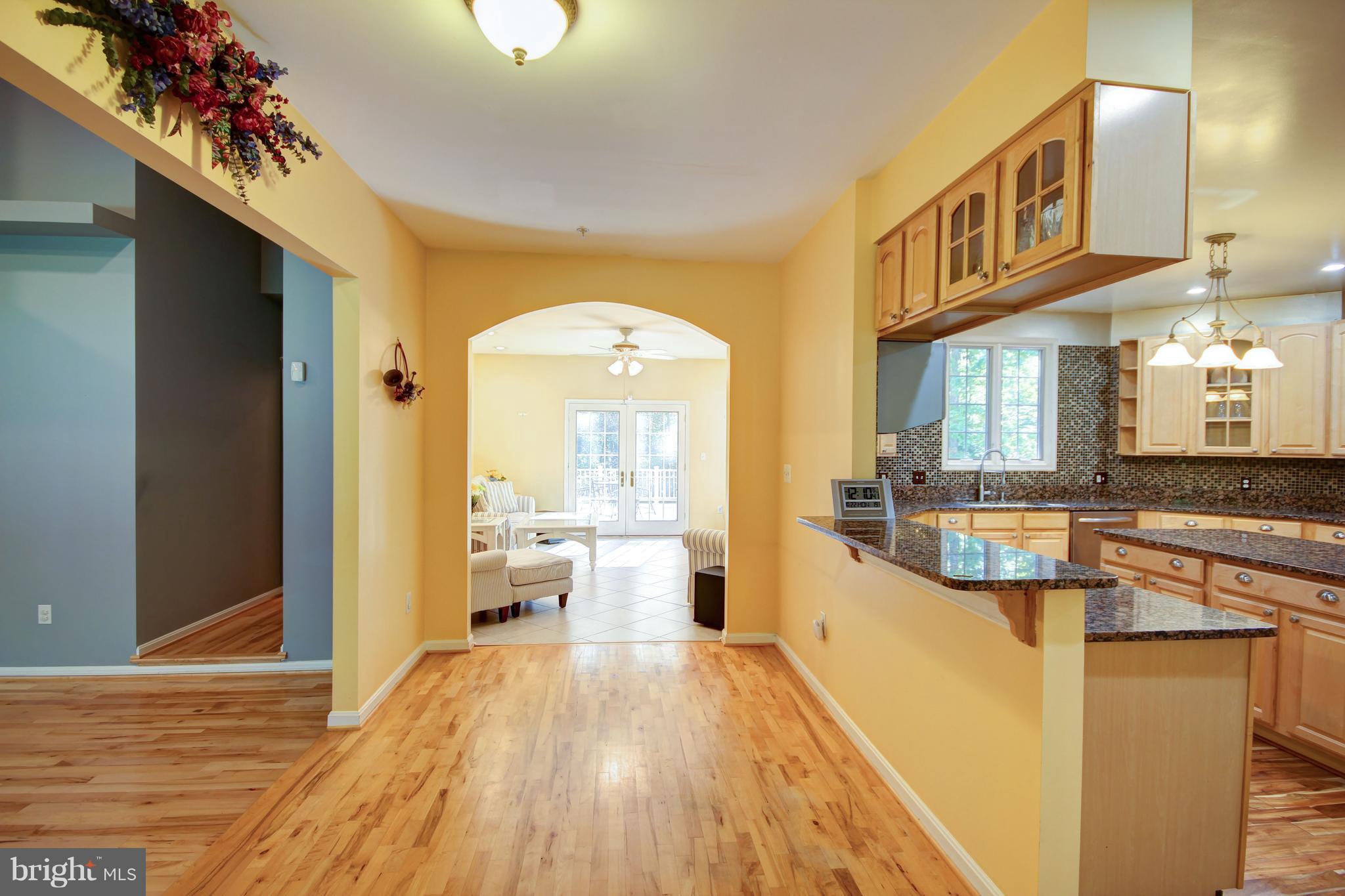 9020 Race Track Road Bowie, MD 20715 - Photo 8 of 52 Breakfast Bar open to Sun Room