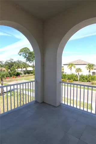 a view of a city street from a balcony