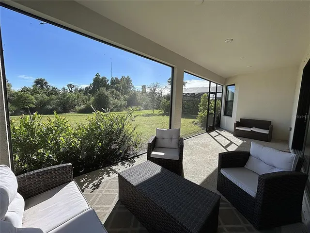 a view of a balcony with lake view and a ocean view