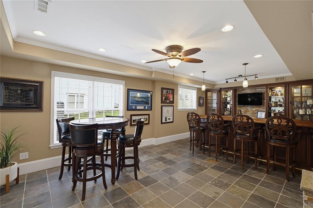 14442 Club Circle Milton, GA 30004 - Photo 51 of 82 a view of a dining room with furniture