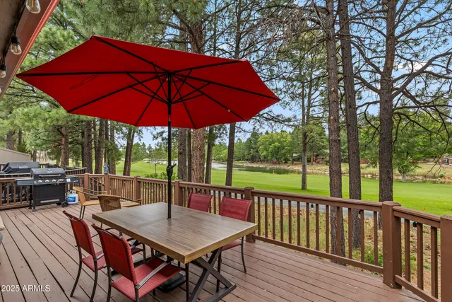 a view of a golf course with a lake view