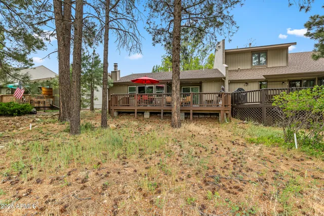 a picture of a room with lots of frames