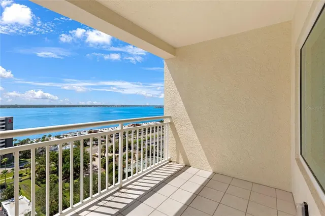 a view of balcony with furniture