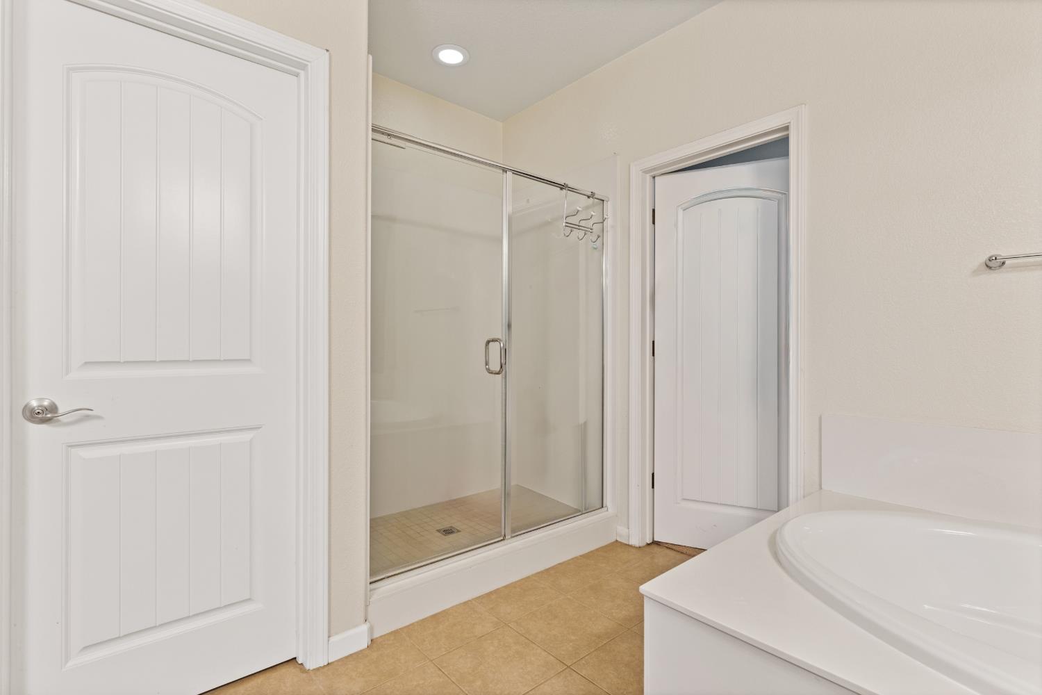 2011 Roy Ranch Way Plumas Lake, CA 95961 - Photo 23 of 49 a bathroom with a shower and a tub