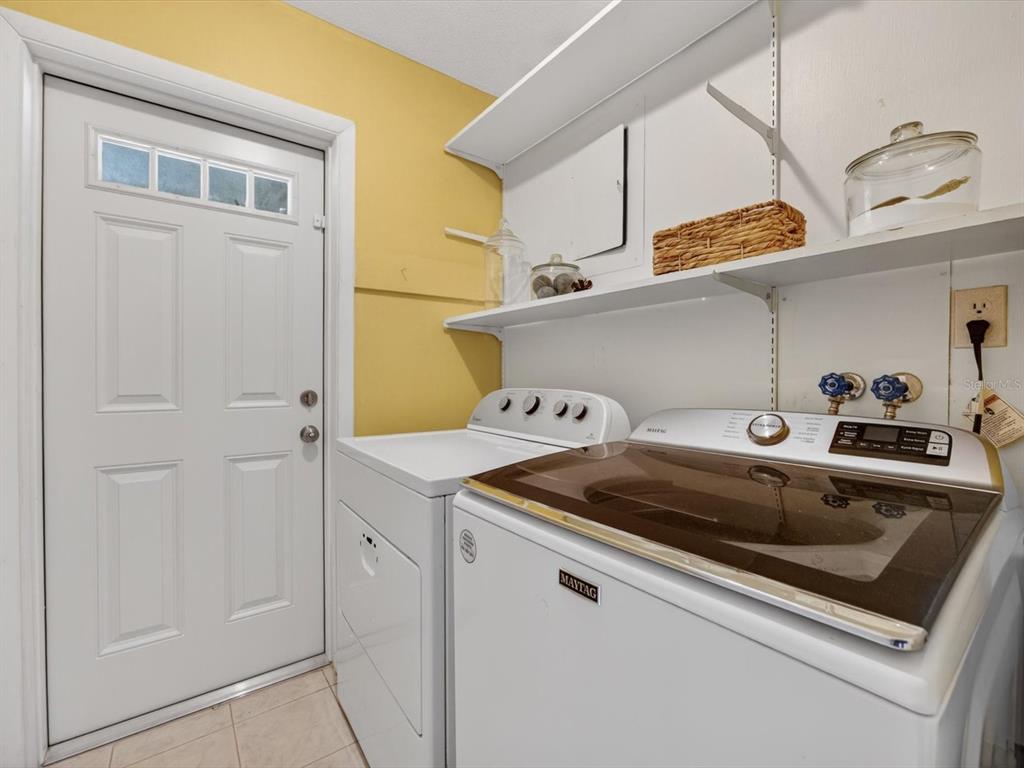 2803 Banchory Road Winter Park, FL 32792 - Photo 21 of 31 a utility room with dryer and washer
