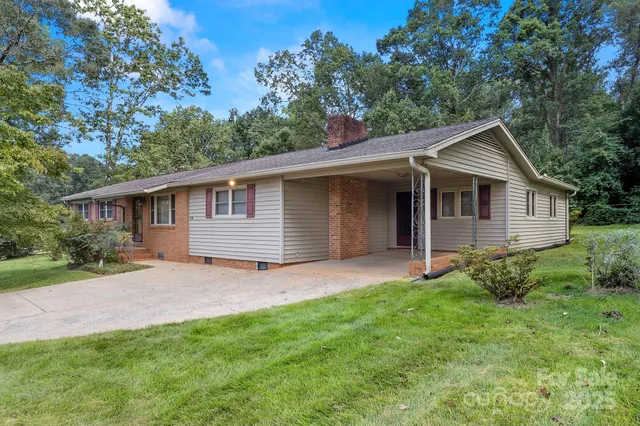 a backyard of a house with seating space