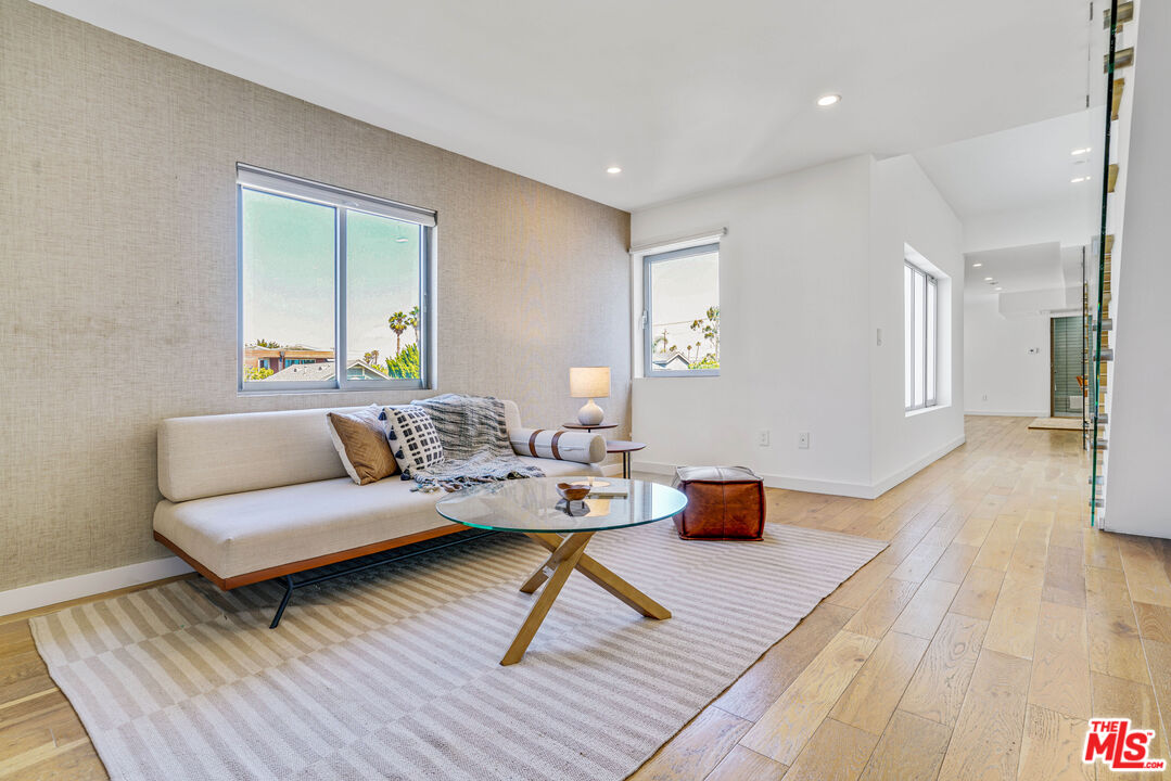 809 Brooks Avenue Venice, CA 90291 - Photo 13 of 32 a living room with furniture and a wooden floor