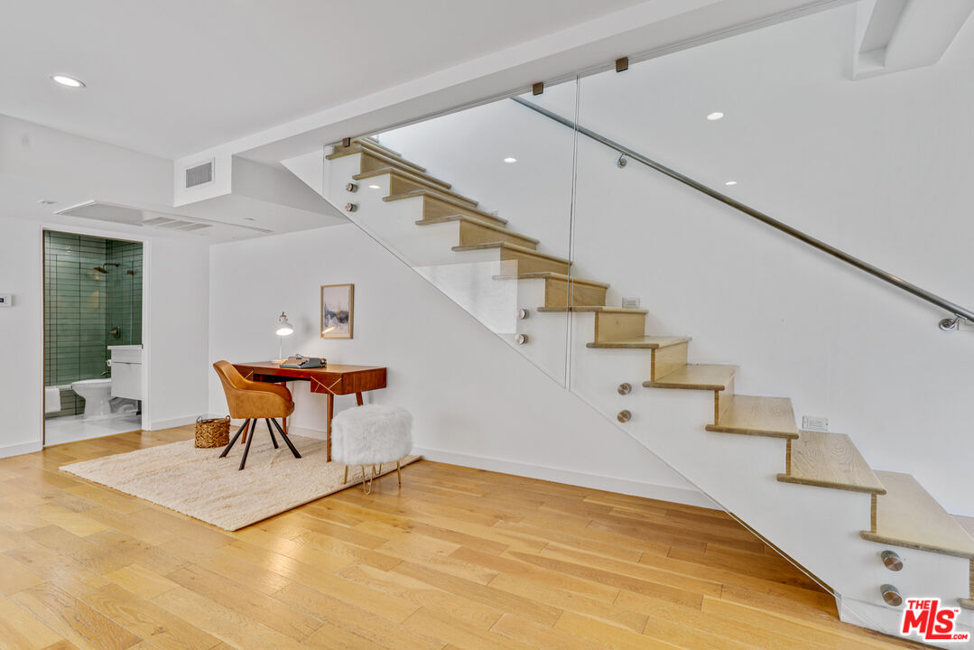 809 Brooks Avenue Venice, CA 90291 - Photo 15 of 32 a room with stairs and white walls