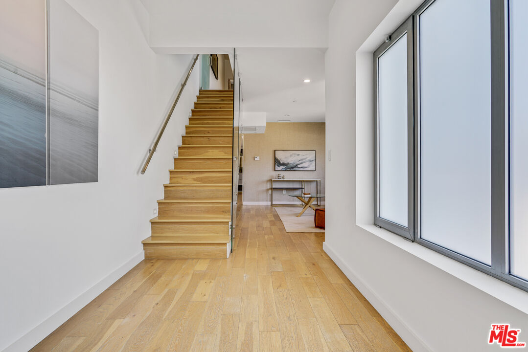 809 Brooks Avenue Venice, CA 90291 - Photo 21 of 32 a view of entryway and hall with wooden floor