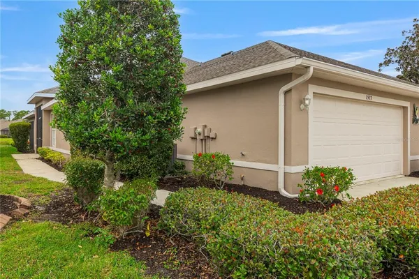 a view of a back yard of the house
