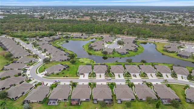 an aerial view of a house with a garden
