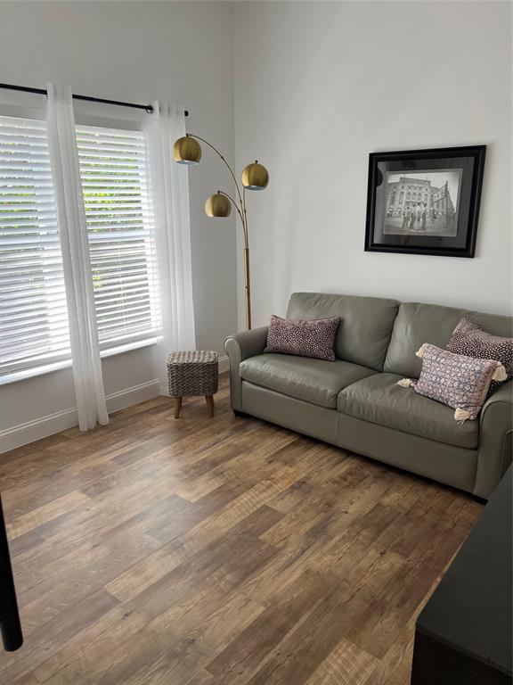 7352 Southeast Seagate Lane Stuart, FL 34997 - Photo 11 of 19 a living room with furniture and a window
