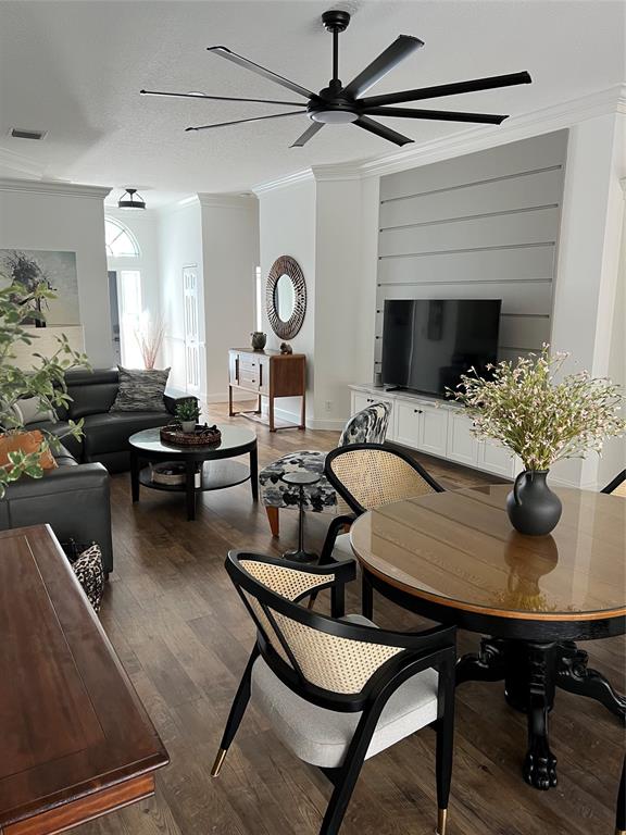 7352 Southeast Seagate Lane Stuart, FL 34997 - Photo 4 of 19 a living room with furniture and a fireplace