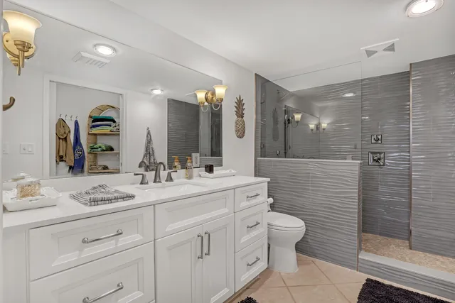 a bedroom with bed and a window