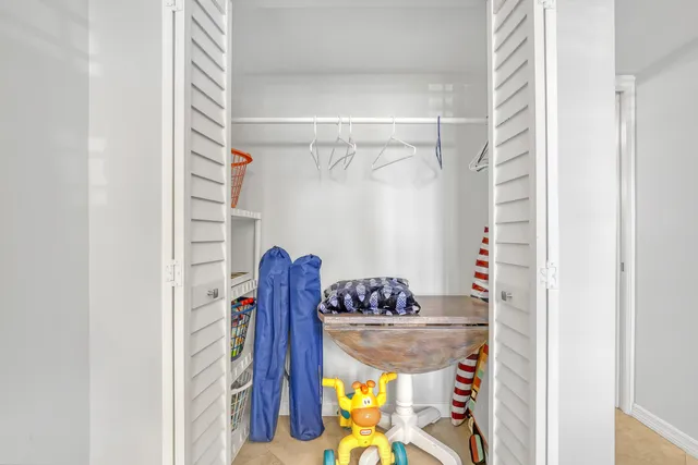 a view of a balcony with wooden floor and outdoor space