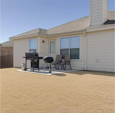 a view of pool with outdoor seating