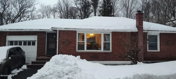 a house with yard in front of it