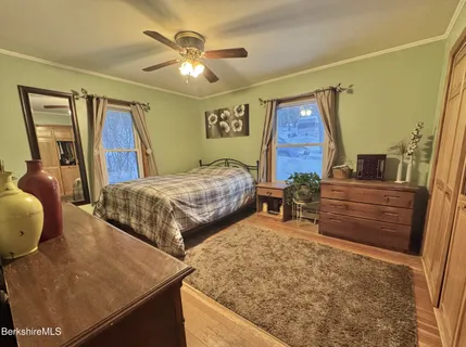 a bed room with a bed and furniture