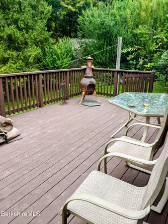 a view of a patio with a two chairs
