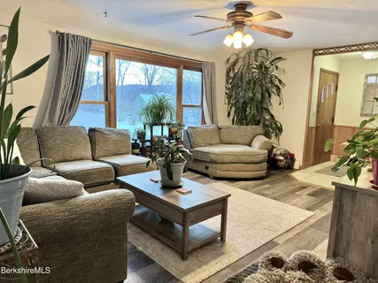 a kitchen with a sink a stove and cabinets