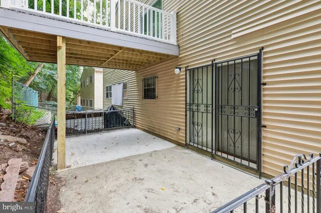 a view of backyard with cabin