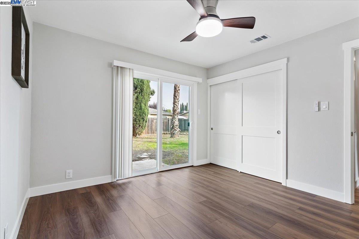 1154 Tilson Drive Concord, CA 94520 - Photo 20 of 25 wooden floor in an empty room with a window