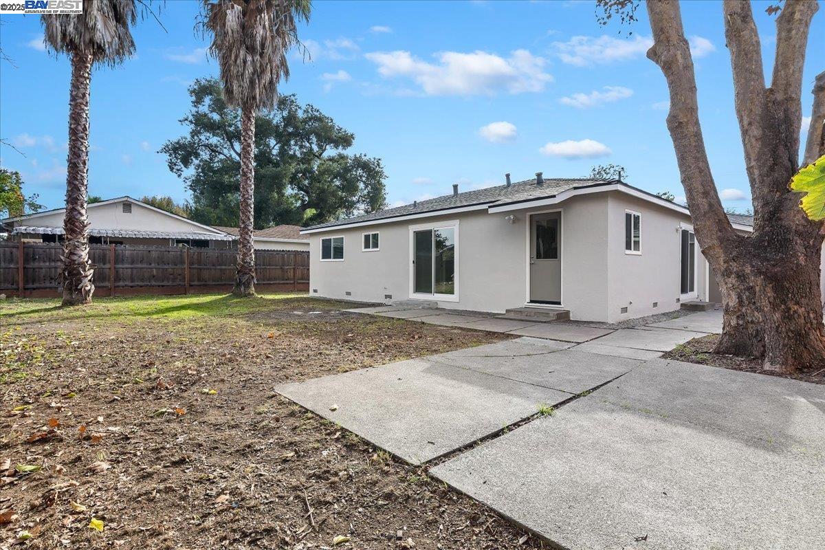 1154 Tilson Drive Concord, CA 94520 - Photo 22 of 25 a white house that has a tree in front of it