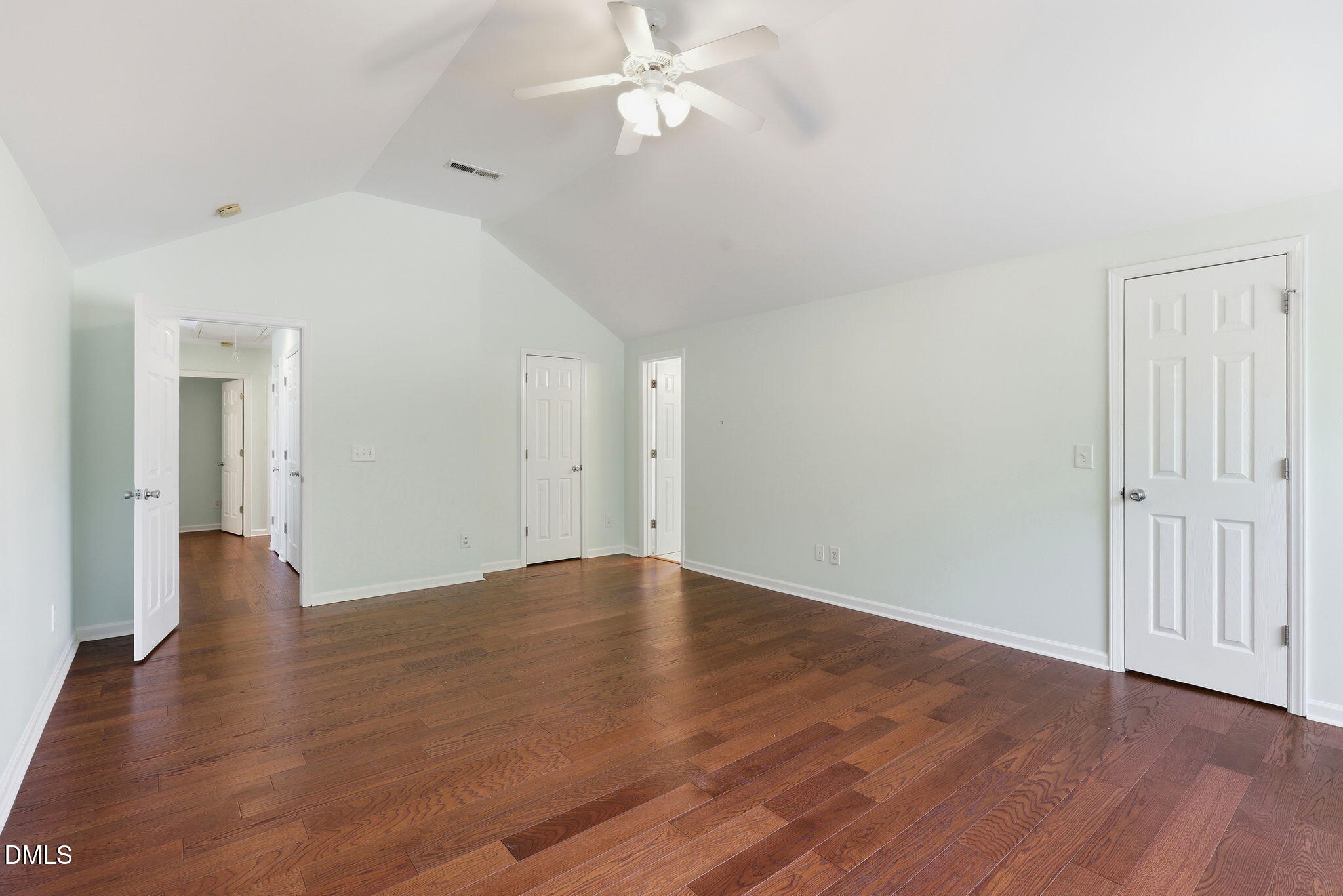4232 Dalcross Road Raleigh, NC 27610 - Photo 19 of 42 a view of an empty room with wooden floor